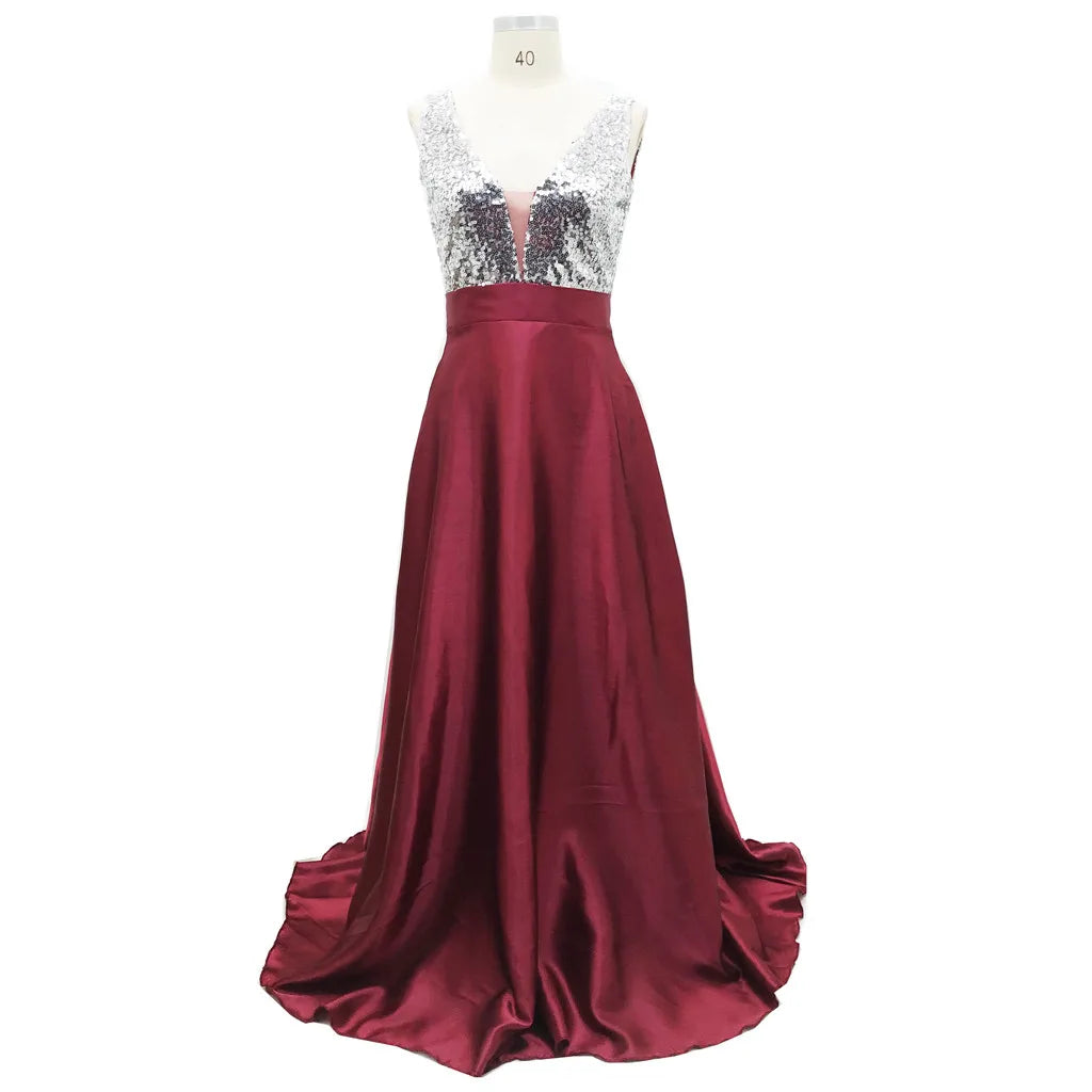 Deep V Maxi Dress With Textured Bodice And Flowing Skirt