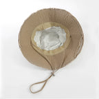 Minimalist Bucket Hat with Soft Brim and Decorative Tassel Detail for Everyday Outdoor Style