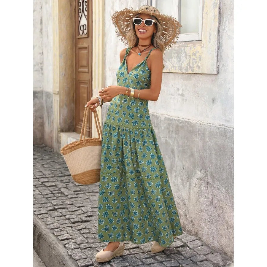 Sleeveless Floral Maxi Dress with Cinched Waist and Flowing A-Line Shape