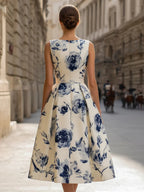 Elegant Blue Floral Print Sleeveless Midi Dress with Pleated Skirt