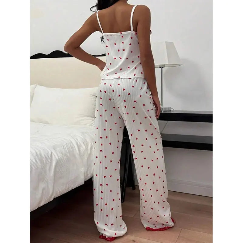 Playful Heart Print V-Neck Loungewear Jumpsuit with Pink Lace Trim and Ribbon Bows