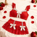 Playful Ruffled Black Lace Bralette and Mini Skirt Set with Contrast White Bows