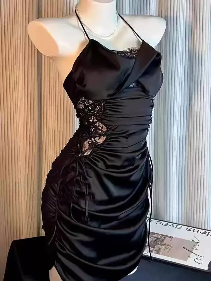 Form-Fitting Black Halter Mini Dress with Ruched Side Ties and Lace Accents