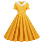 Vintage-Inspired Yellow Swing Dress with Contrast Collar and Decorative Buttons