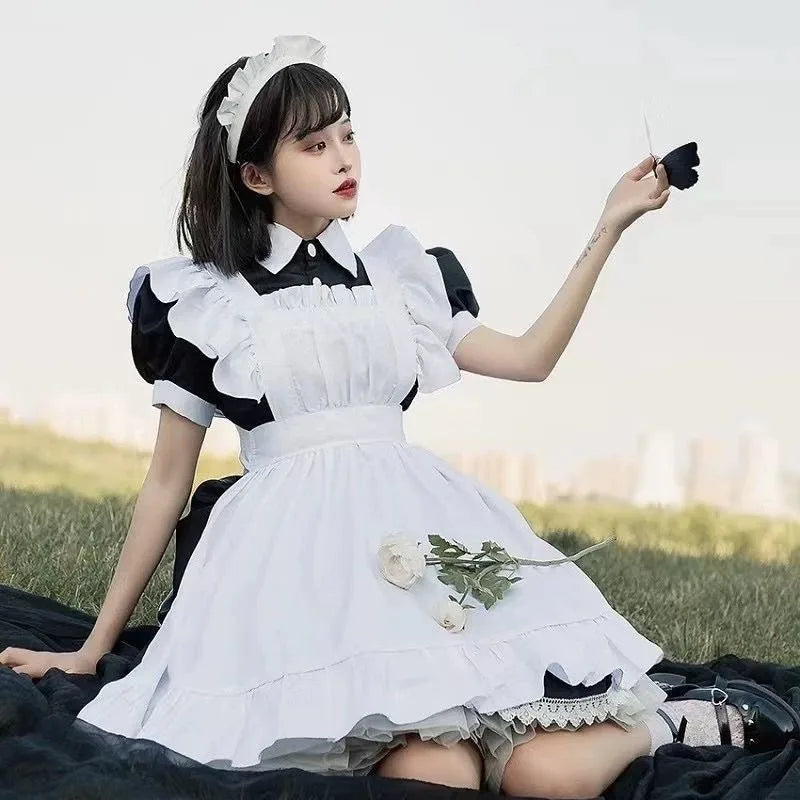 Classic Monochromatic Ruffled Maid Dress with Sweetheart Bow Detailing