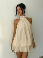 Elegant Cream Halter-Neck Mini Dress with Fluid Draped Silhouette