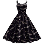 Retro 1950s Swing Dress with Sweetheart Neckline and Bat Print Motif