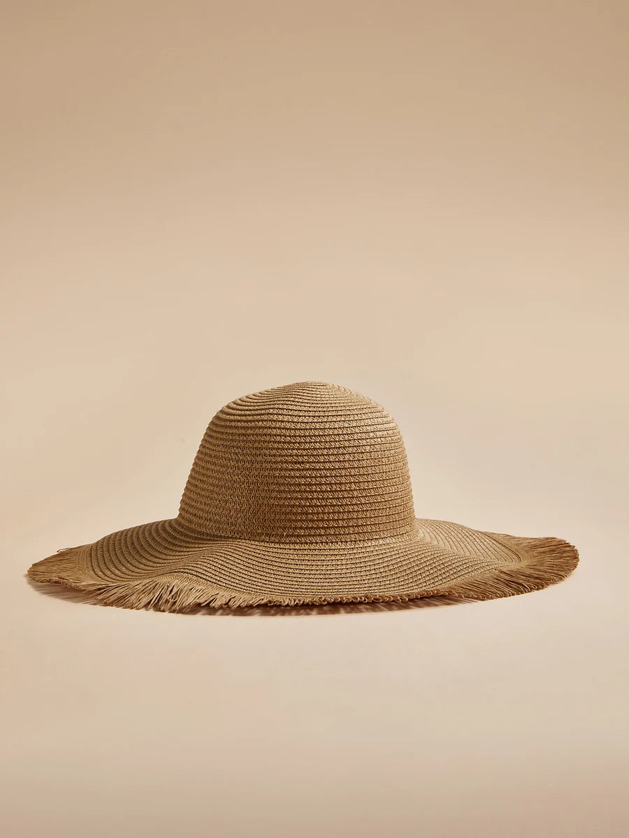 Oversized Woven Straw Sun Hat with Fringe Trim for Beach Travel and Resort Styling