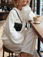 Women's Minimalist Crew Neck Knit Sweater with Relaxed Long Sleeve Silhouette