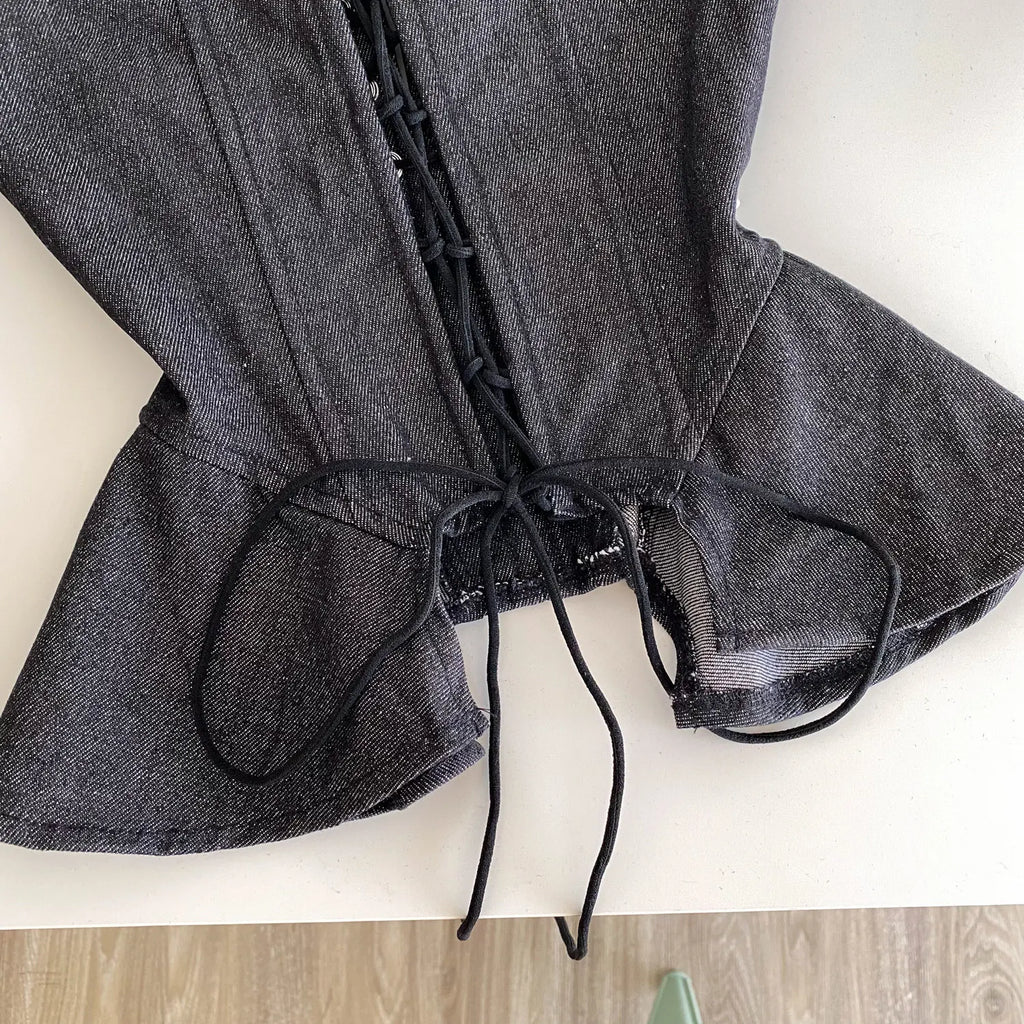 Dark Denim-Inspired Strapless Lace-Up Bustier with Asymmetrical Peplum Hem