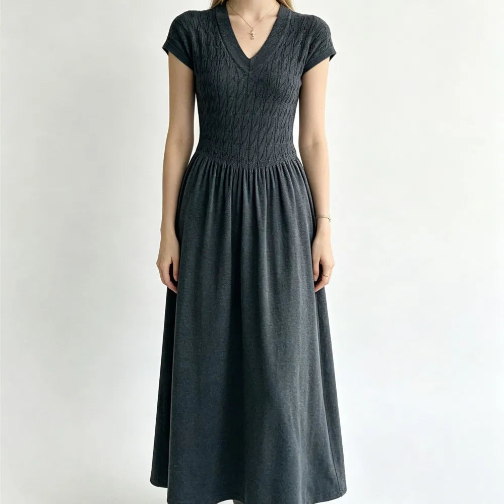 Elegant Short-Sleeve Smocked A-Line Midi Dress in Classic Black