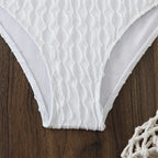 Crisp White Three-Piece String Bikini Set with Sheer Lace Long-Sleeve Cover-Up