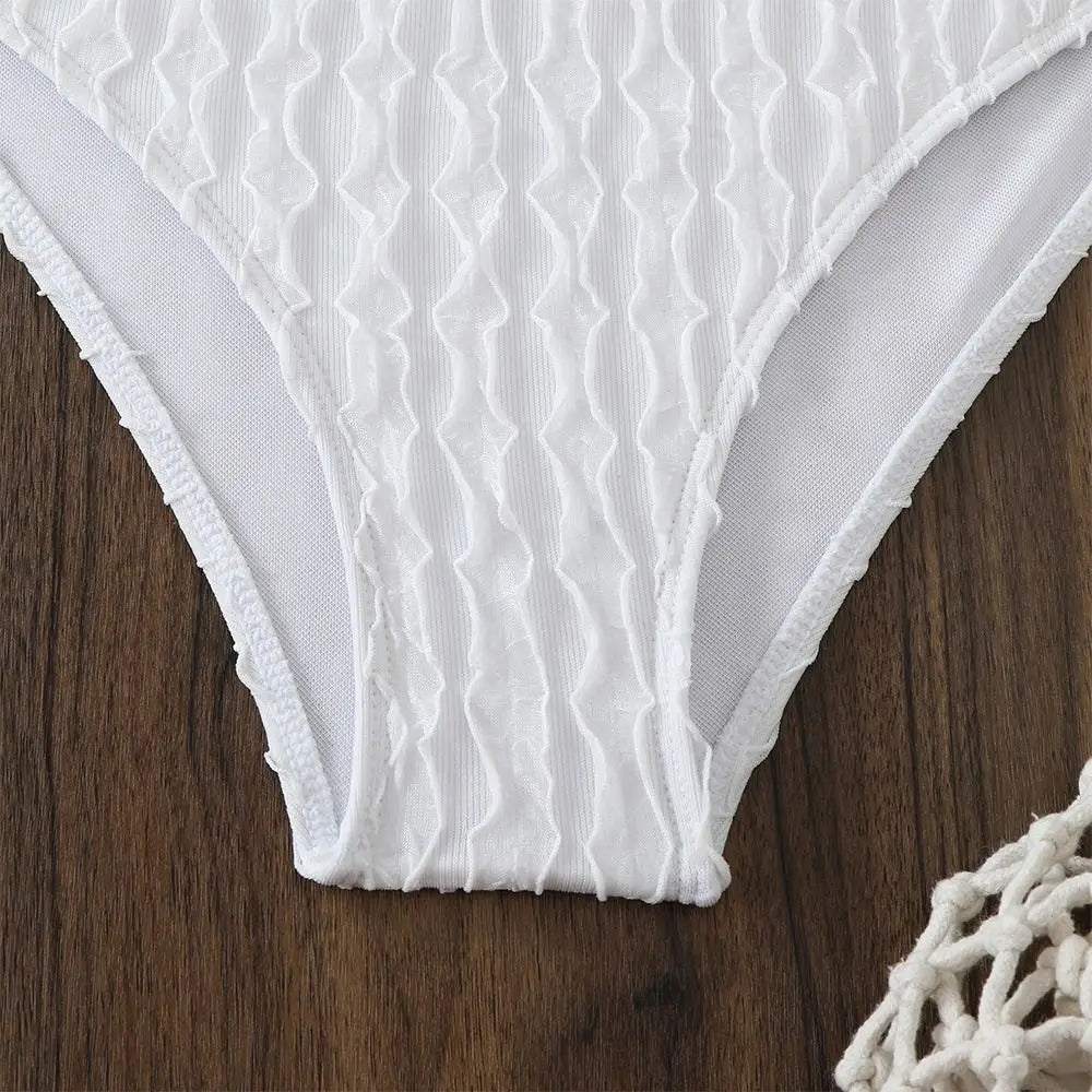 Crisp White Three-Piece String Bikini Set with Sheer Lace Long-Sleeve Cover-Up