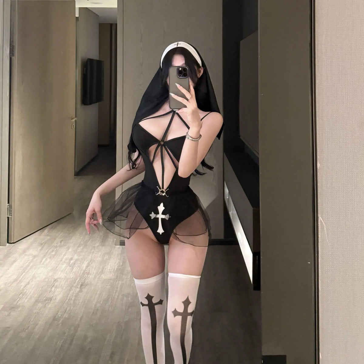 Bold Cutout Nun-Inspired Bodysuit with Sheer Skirt and Coordinated Headpiece