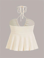 Cross Strap Halter Backless Crop Top with Flared Hem Contemporary Streetwear Style
