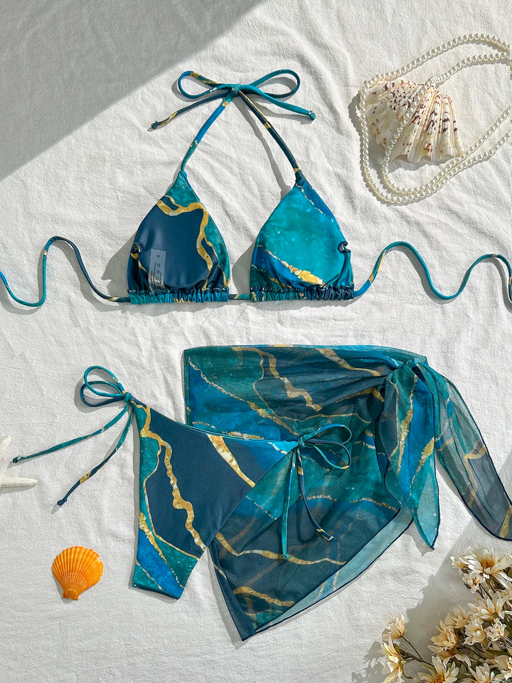Vibrant Blue Marble Print String Bikini Set with Sheer Mesh Wrap Skirt