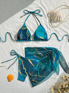 Vibrant Blue Marble Print String Bikini Set with Sheer Mesh Wrap Skirt