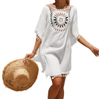 Boho Crochet Beach Cover-Up Tunic with Tassel Details, Loose Open-Knit Design and Bikini Layering Silhouette