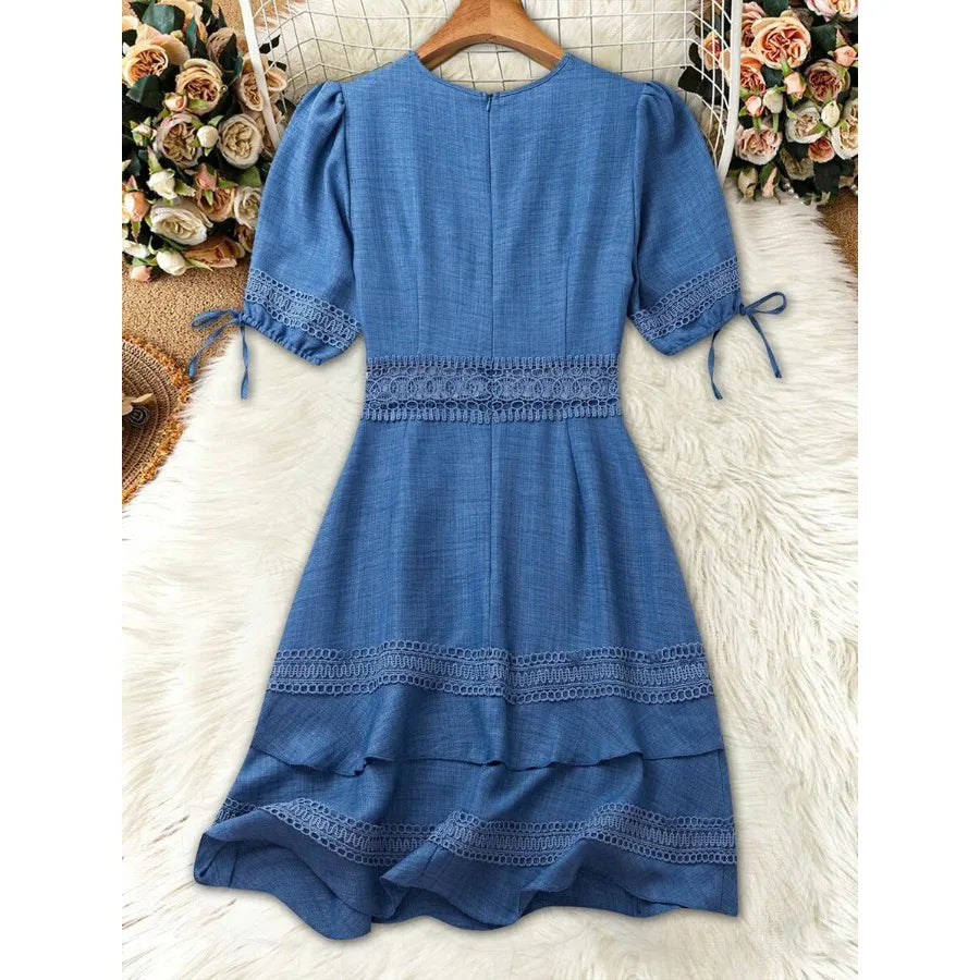 Flowing Blue V-Neck Mini Dress with Tiered Ruffles and Delicate Embroidery Details
