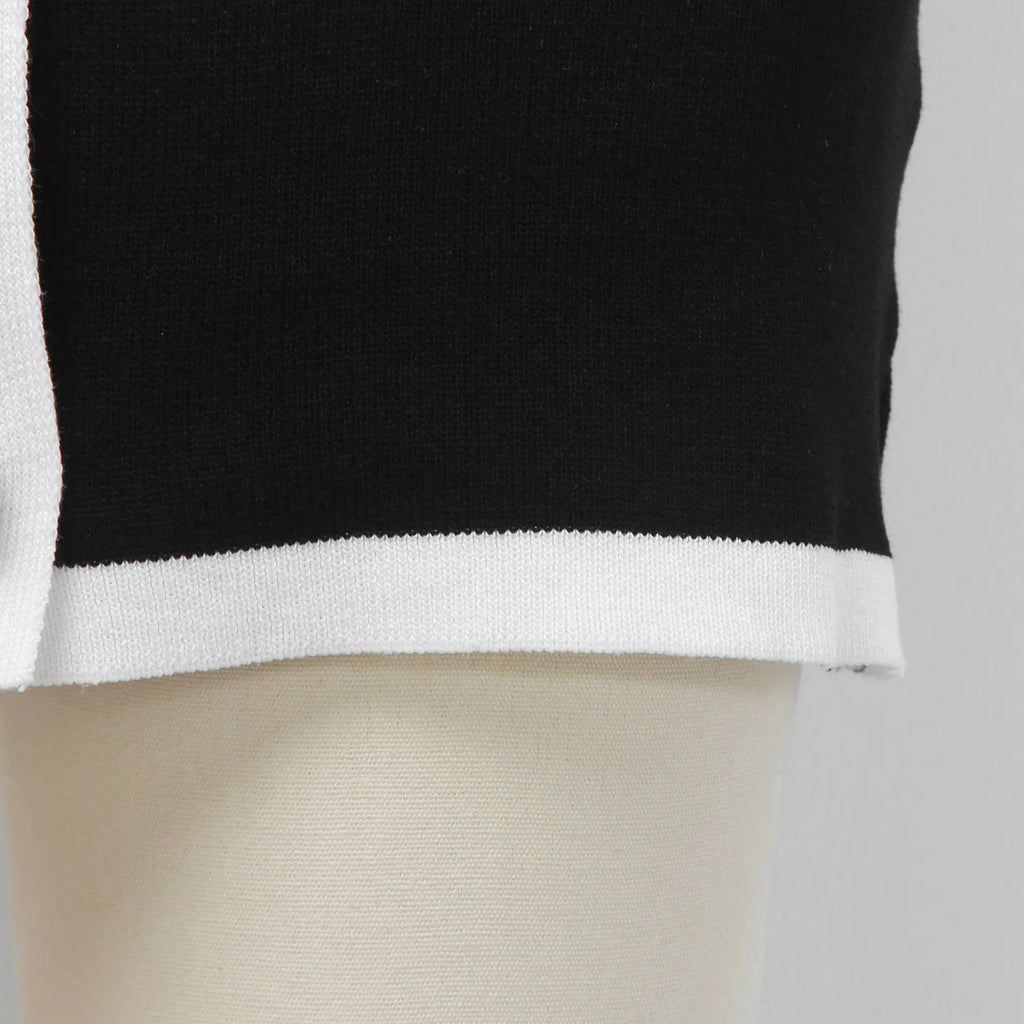 Chic Black Contrast-Trim Sleeveless Mini Dress with Faux Button Detailing