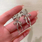Ribbon Cross Ear Cuff with Layered Hoops for Alternative Fashion