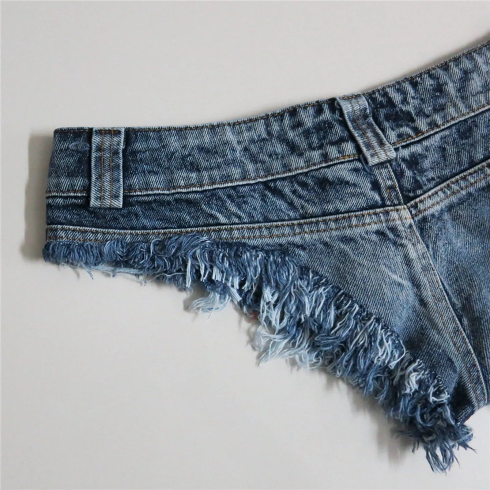 Women's Low Rise Raw Edge Denim Style Shorts with Slim Fit Beach Fashion Design