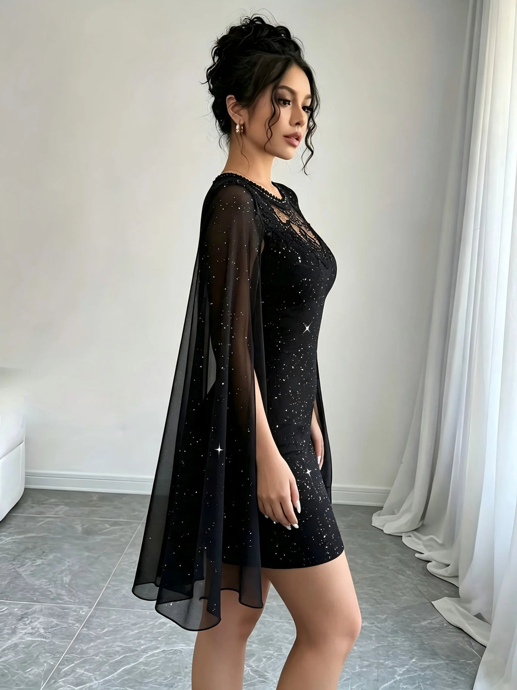Glamorous Black Glitter Mini Dress with Sheer Lace Yoke and Flowing Cape Sleeves