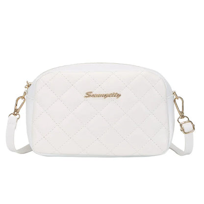 Quilted Chain Strap Saddle Crossbody Bag with Tassel Accent Design