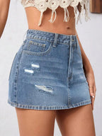 Distressed Denim Mini Skirt with Ripped Details and Streetwear Edge