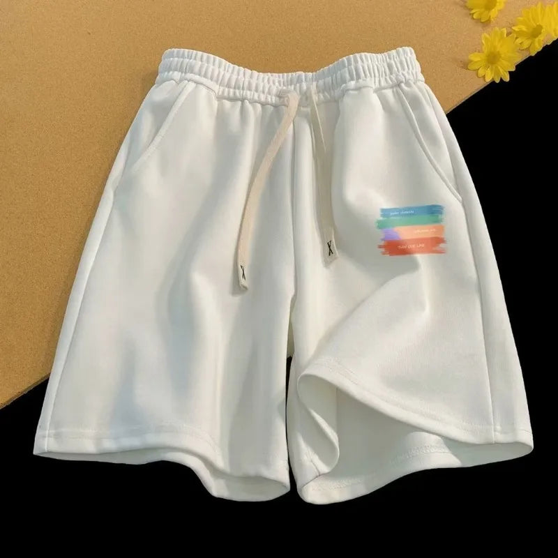 Relaxed Fit Drawstring Streetwear Shorts with Graphic Detail and Athletic Silhouette