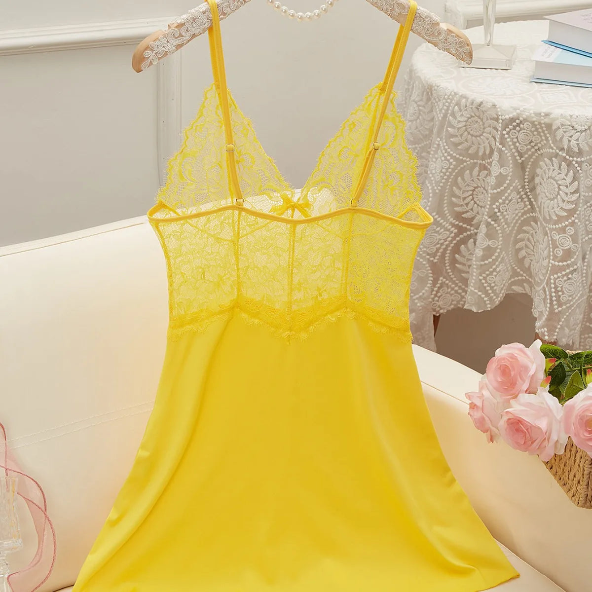Soft Pink Sheer Lace Chemise with Plunging V-Neckline and Flowing Skirt