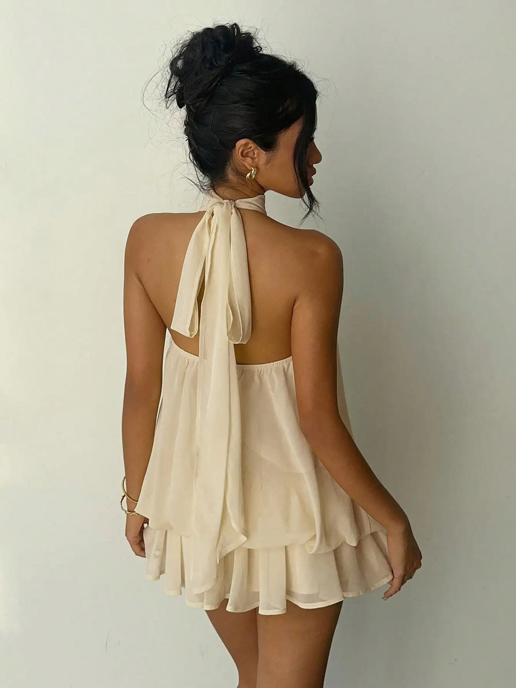 Elegant Cream Halter-Neck Mini Dress with Fluid Draped Silhouette