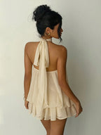 Elegant Cream Halter-Neck Mini Dress with Fluid Draped Silhouette