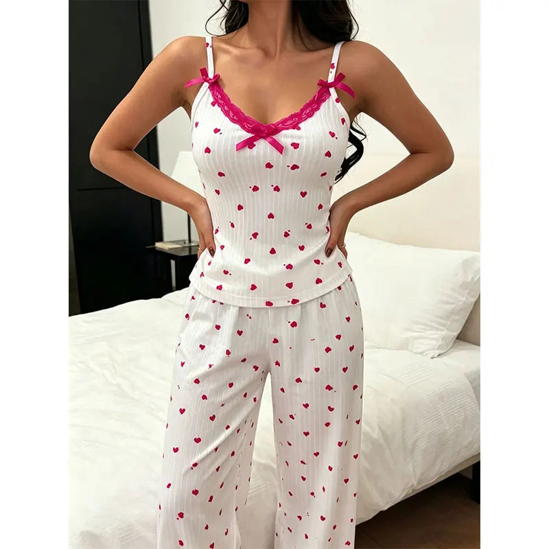 Playful Heart Print V-Neck Loungewear Jumpsuit with Pink Lace Trim and Ribbon Bows