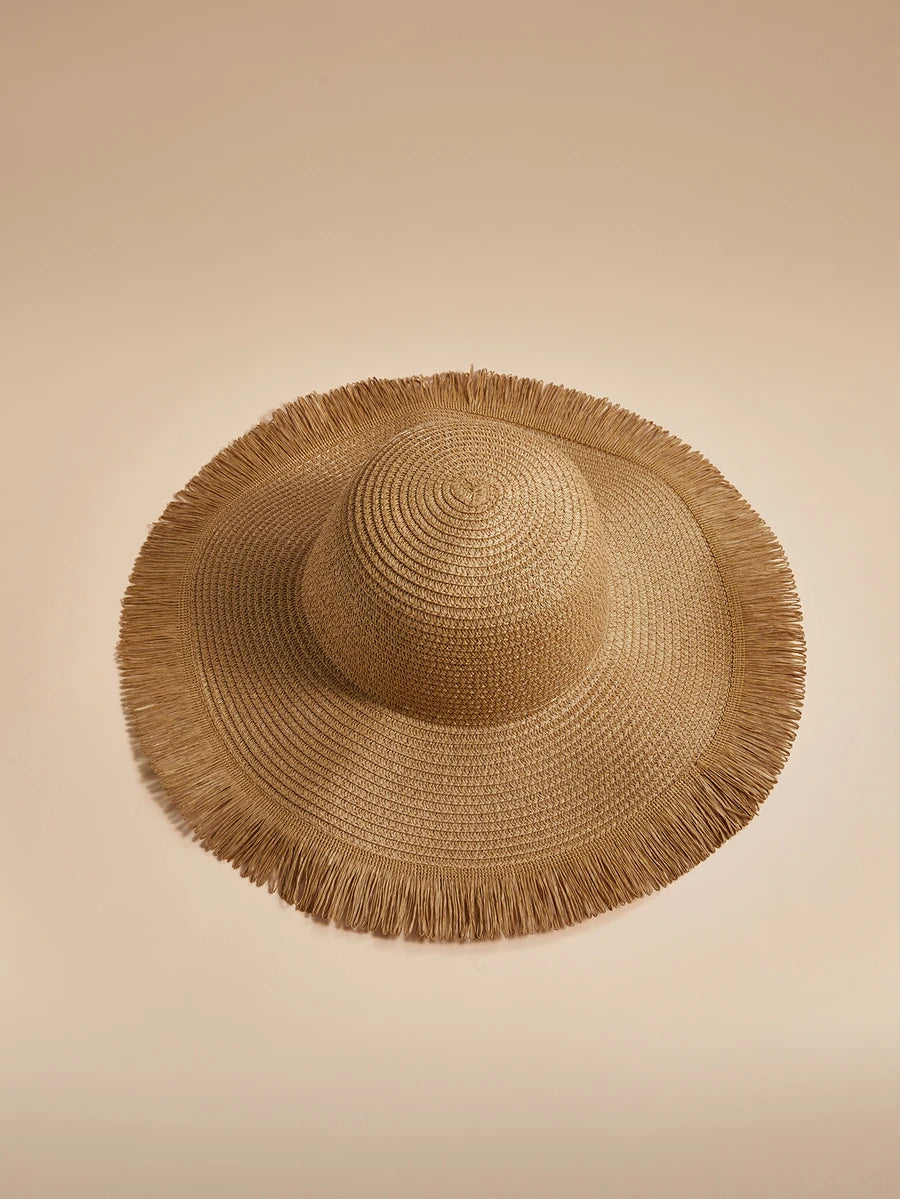 Oversized Woven Straw Sun Hat with Fringe Trim for Beach Travel and Resort Styling