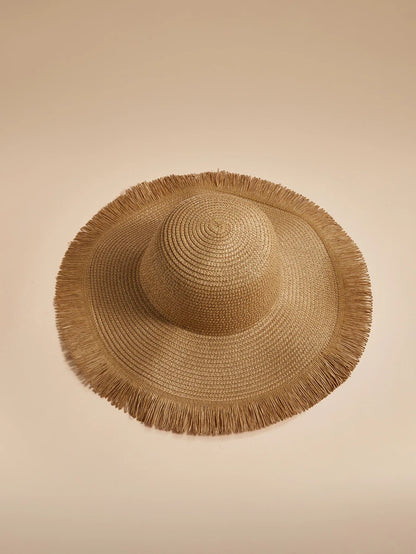 Oversized Woven Straw Sun Hat with Fringe Trim for Beach Travel and Resort Styling