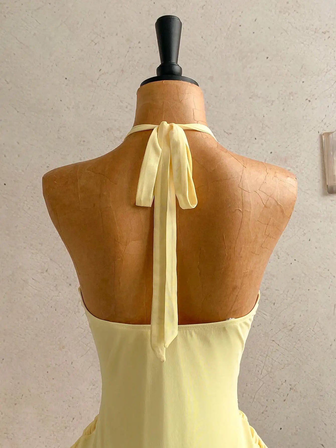 Ruched Halter Mini Dress with Tie Neck Detail and Flared Hem