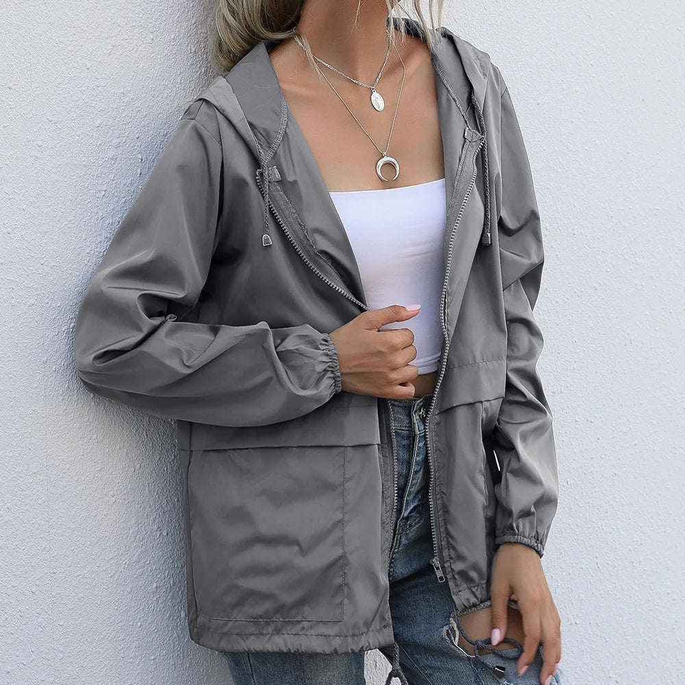 Women's Hooded Waterproof Windproof Outdoor Jacket with Lightweight Thermal Streetwear Windbreaker Design