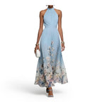 Ethereal Light Blue Halter Maxi Dress with Flowing Floral Print Hem