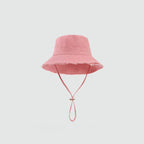 Minimalist Bucket Hat with Soft Brim and Decorative Tassel Detail for Everyday Outdoor Style