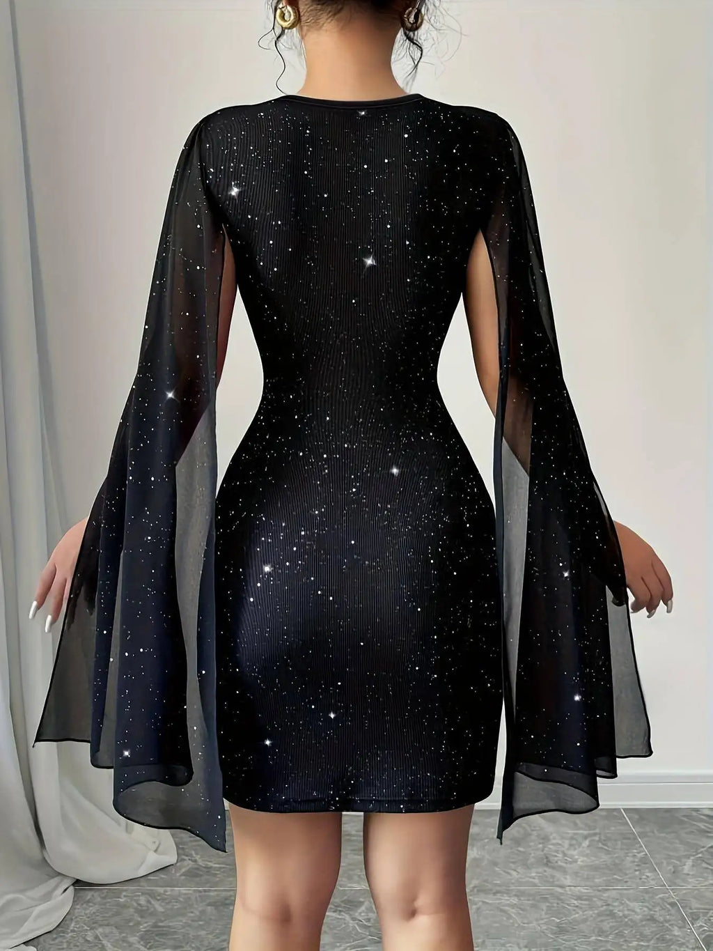 Glamorous Black Glitter Mini Dress with Sheer Lace Yoke and Flowing Cape Sleeves