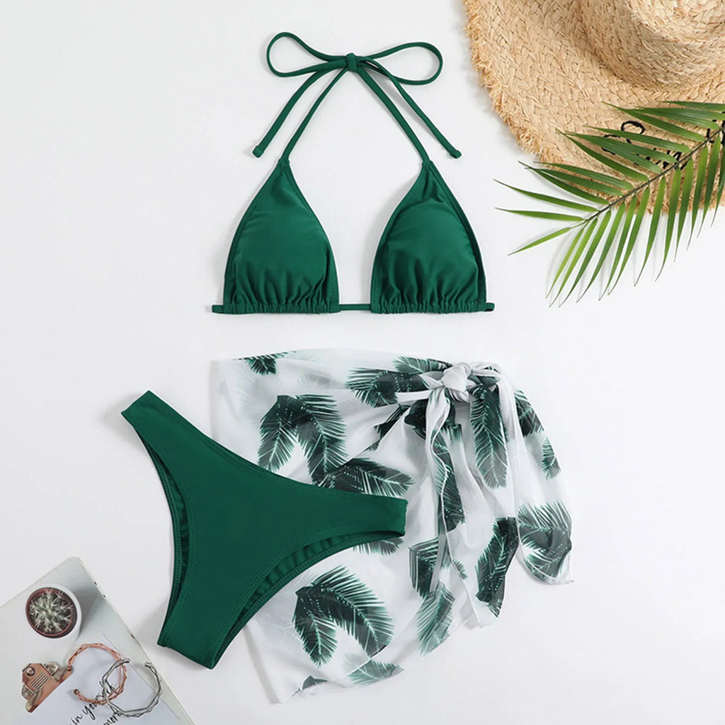 Emerald Green Three-Piece Bikini Set with Halter Triangle Top, Matching Bikini Bottom and Printed Beach Wrap