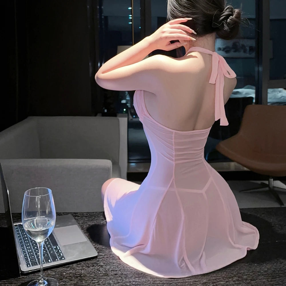 Pastel Pink Halter-Neck Flared Mini Dress with Daring Cutout Bodice