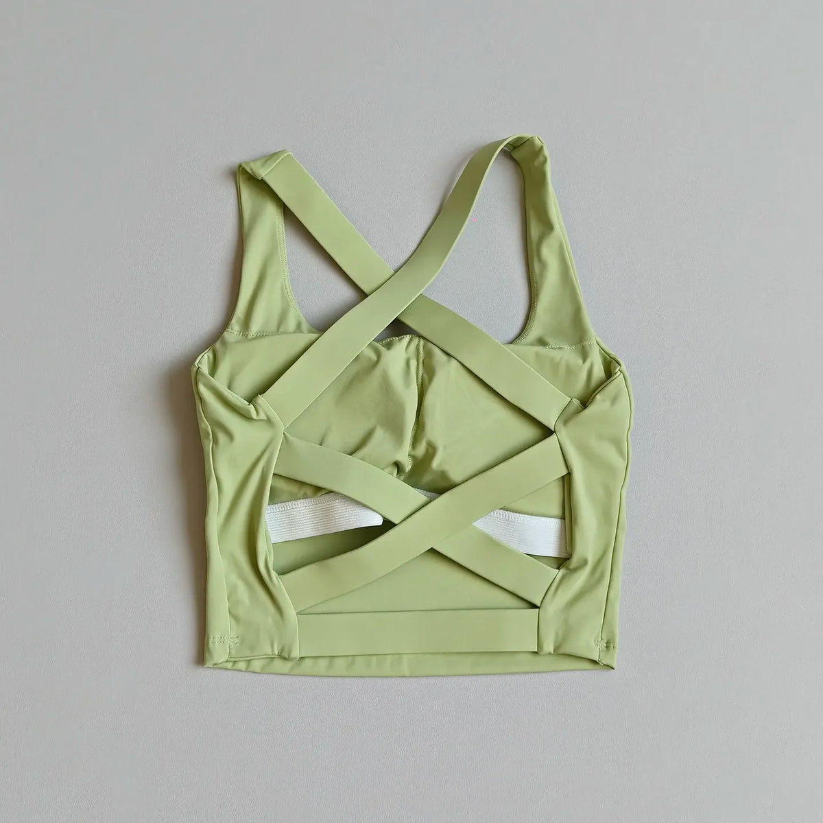 High-Coverage Sports Bra with Architectural Criss-Cross Strappy Back