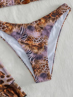 Four-Piece Leopard Print Vacation Ensemble with High-Waisted Skirt and Matching Top
