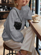 Women's Minimalist Crew Neck Knit Sweater with Relaxed Long Sleeve Silhouette