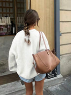 Women's Minimalist Crew Neck Knit Sweater with Relaxed Long Sleeve Silhouette
