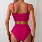 Vibrant Orange Bowknot Bikini Top with High-Waisted Tropical Print Bottom