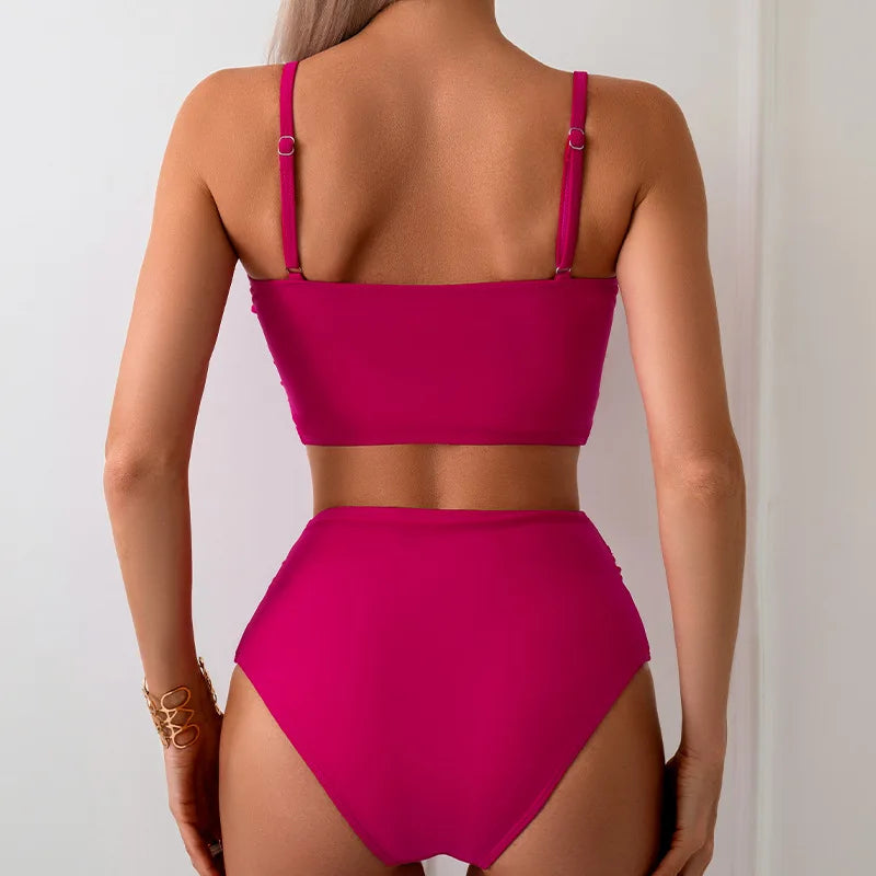 Vibrant Orange Bowknot Bikini Top with High-Waisted Tropical Print Bottom