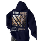 Heavyweight Cityscape Graphic Hoodie with Oversized Streetwear Fit and Back Print